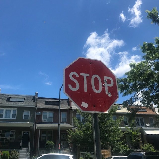 stop sign bullet hole trinidad