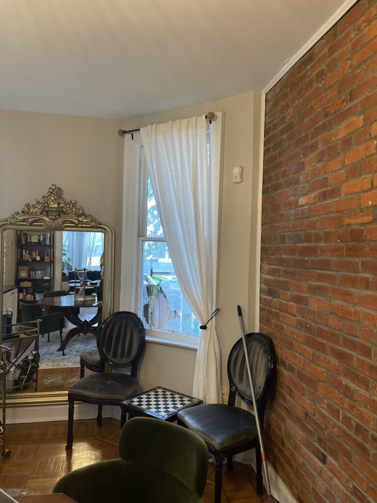 popville window broken brick